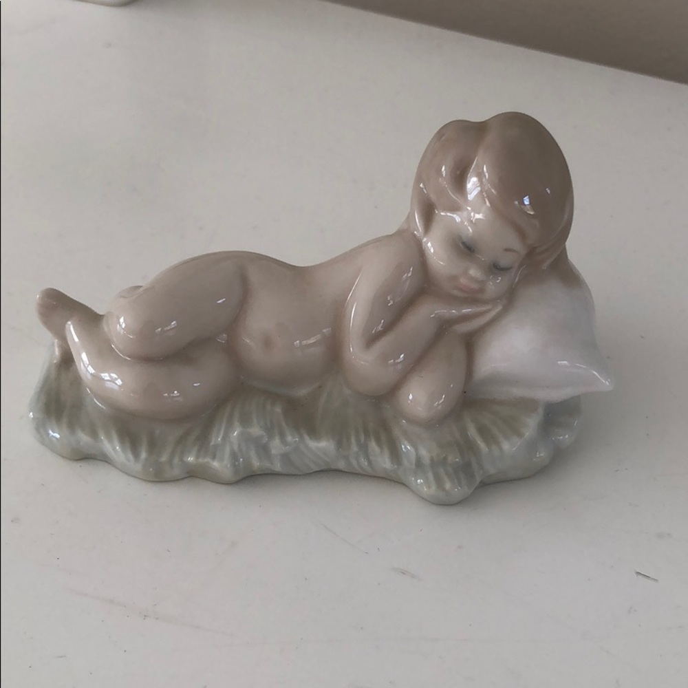 Ladro Baby Sleeping on Pillow